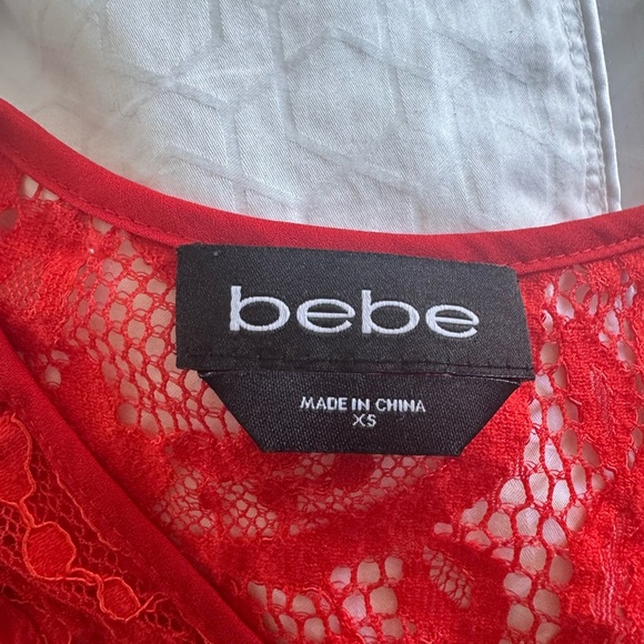 Bebe Red Cut Out Short Sleeve Blouse - Picture 5 of 5